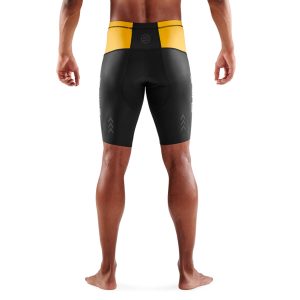 SKINS TRI BRAND HALF TIGHTS BLACK/ZEST - SKINS Compression EU
